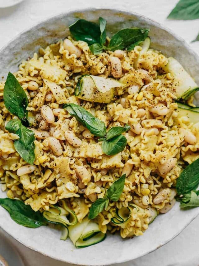 Vegan Pasta recipe that is perfect for your next potluck. Big bowl on white countertop.