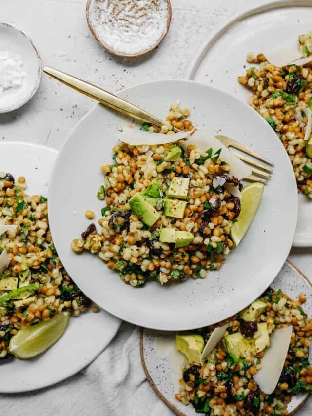 Multiple plates on table loaded with Simple Vegan Salad Recipe.