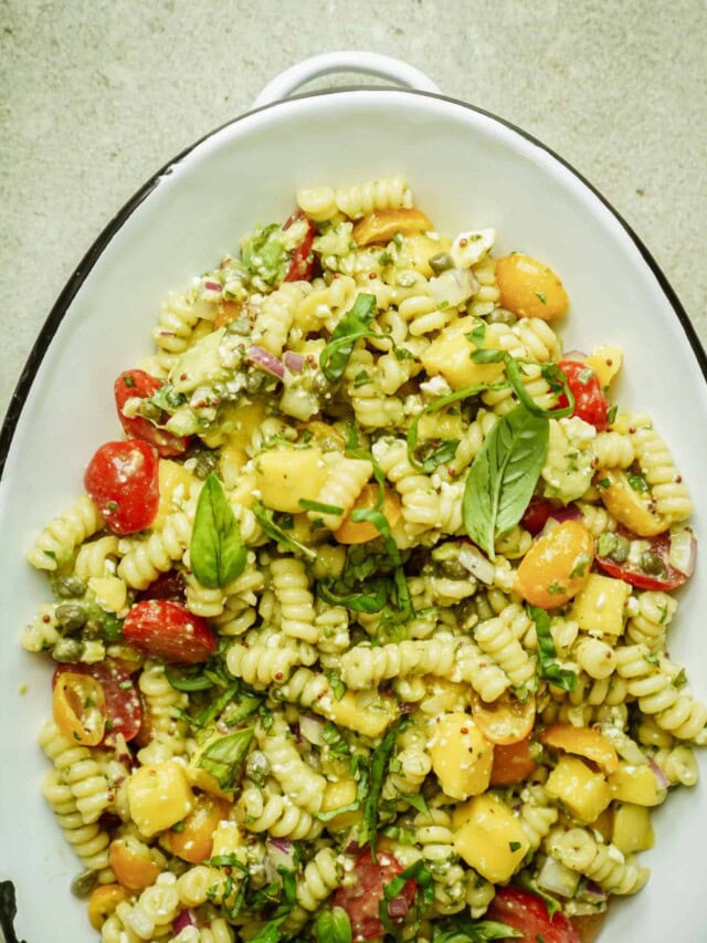 Big serving dish of summer pasta salad