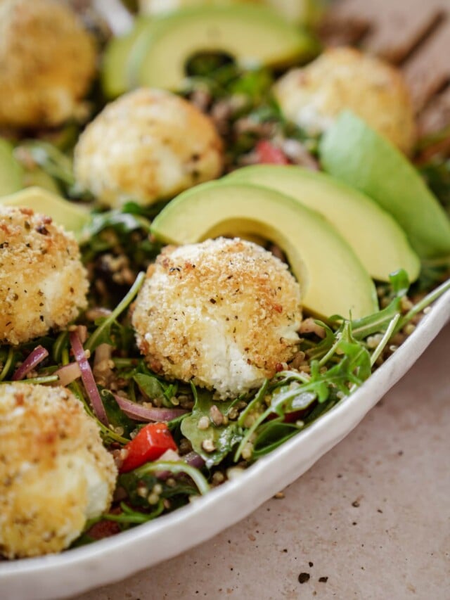 Goat cheese balls in a serving dish