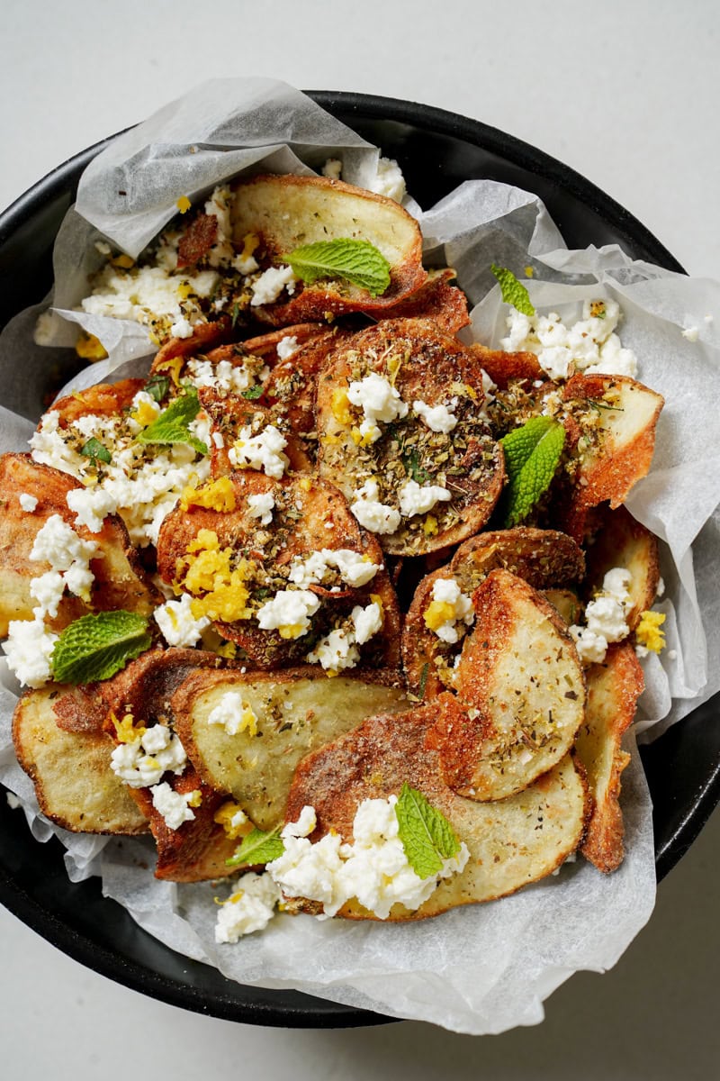 Homemade potato chips with toppings