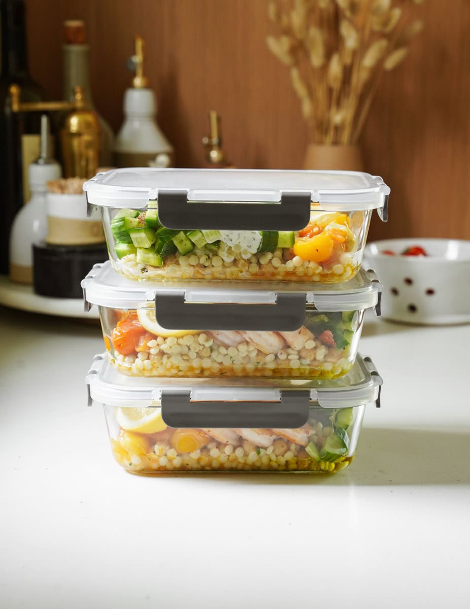 Stack of meal prep bowls on counter