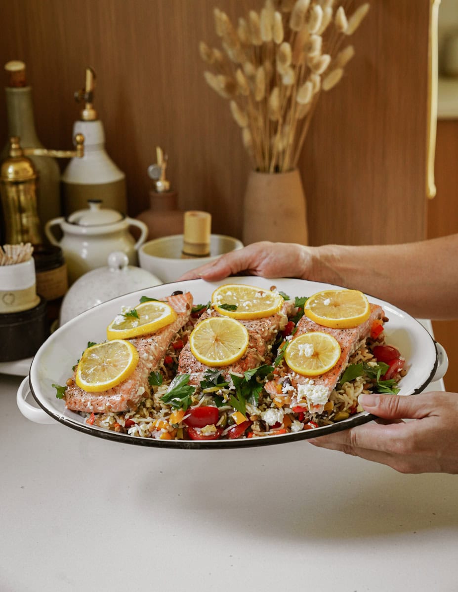 Oven baked rice and trout on a platter