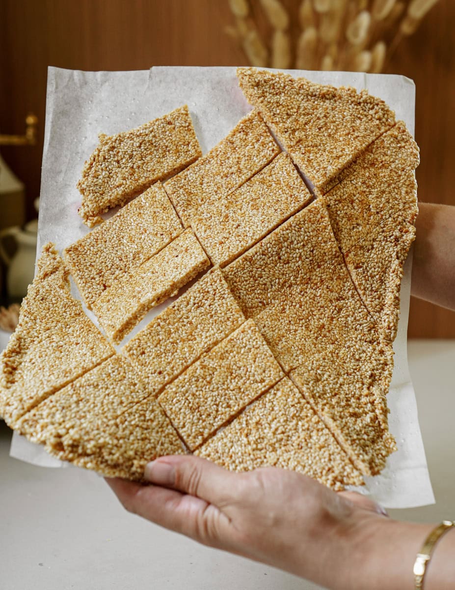 Close up of sesame snaps on tray