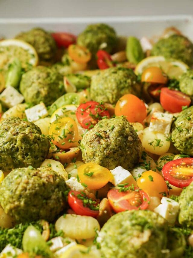 Close up of meatballs on a baking tray